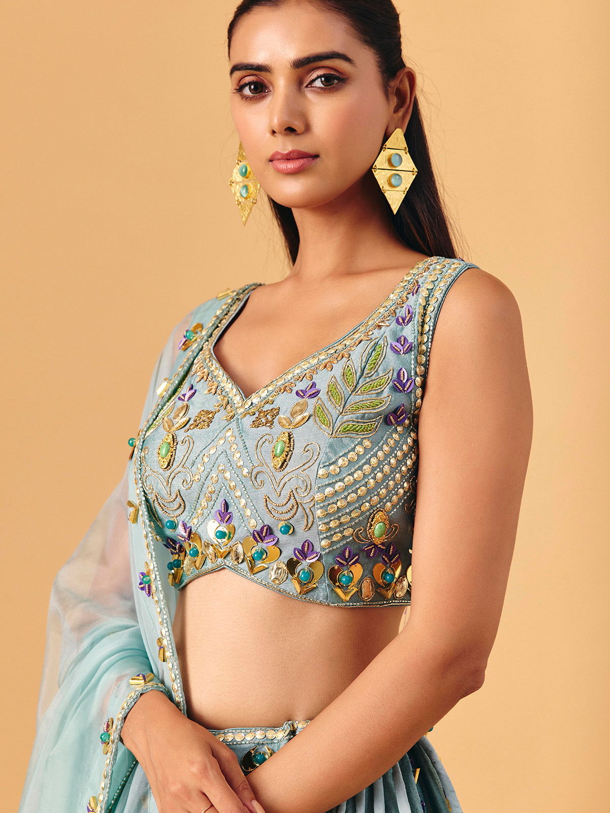 Light grey raw silk lehenga choli with zardosi accents