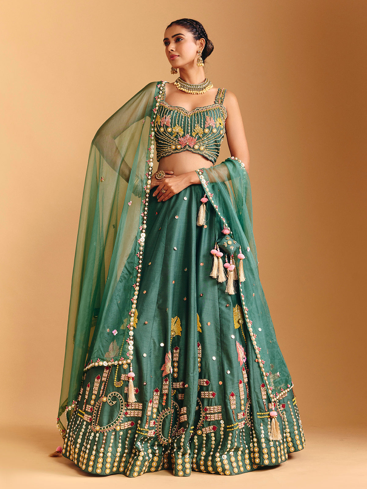 Green raw silk lehenga choli with pearl embellishments
