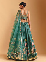 Green raw silk lehenga choli with pearl embellishments