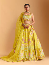 Yellow raw silk lehenga choli with mirror embellishments