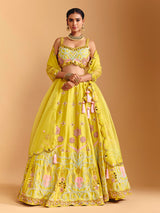 Yellow raw silk lehenga choli with mirror embellishments