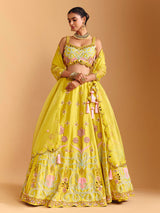 Yellow raw silk lehenga choli with mirror embellishments