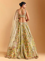 Pista green raw silk lehenga choli with printed artistry