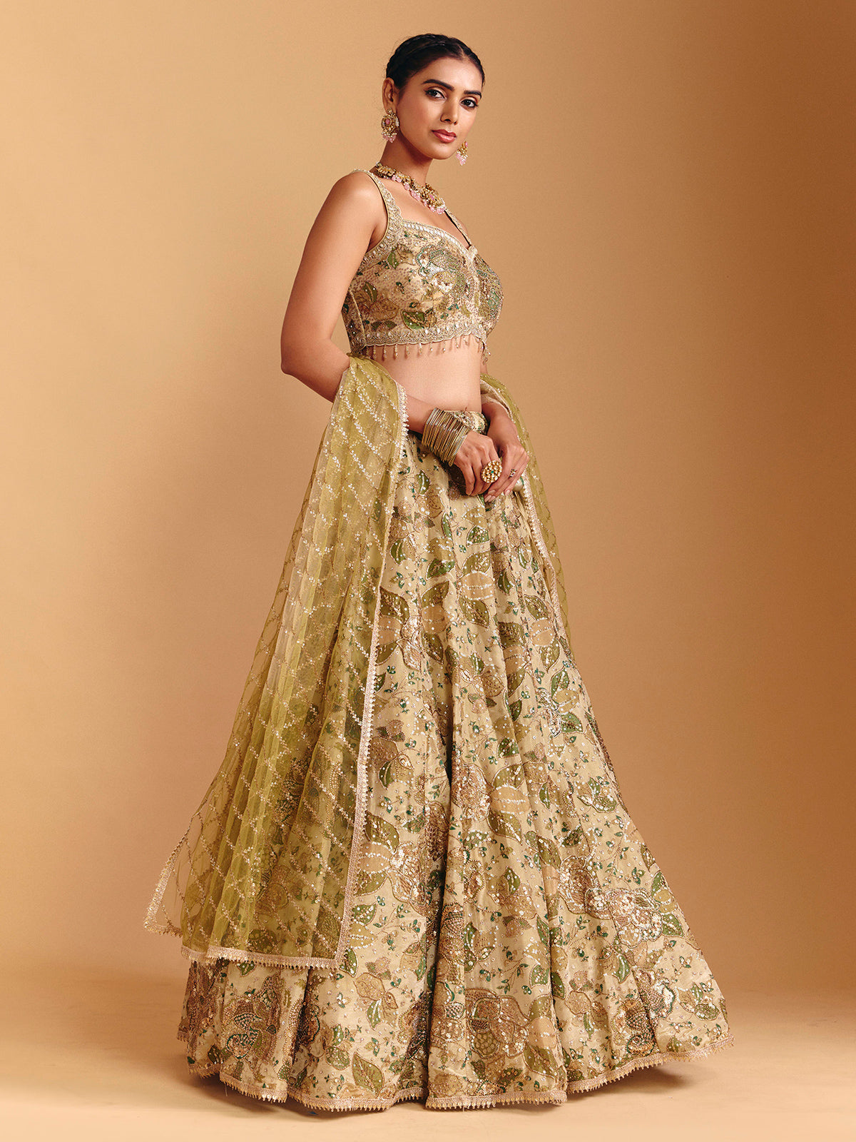 Mehendi green silk lehenga choli with sequin embellishments