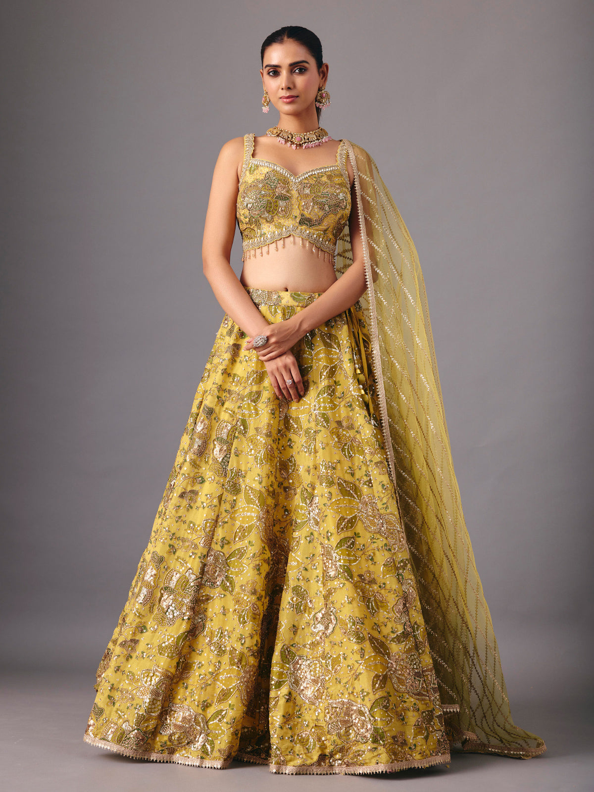 Mehendi yellow georgette silk lehenga choli with embellishments