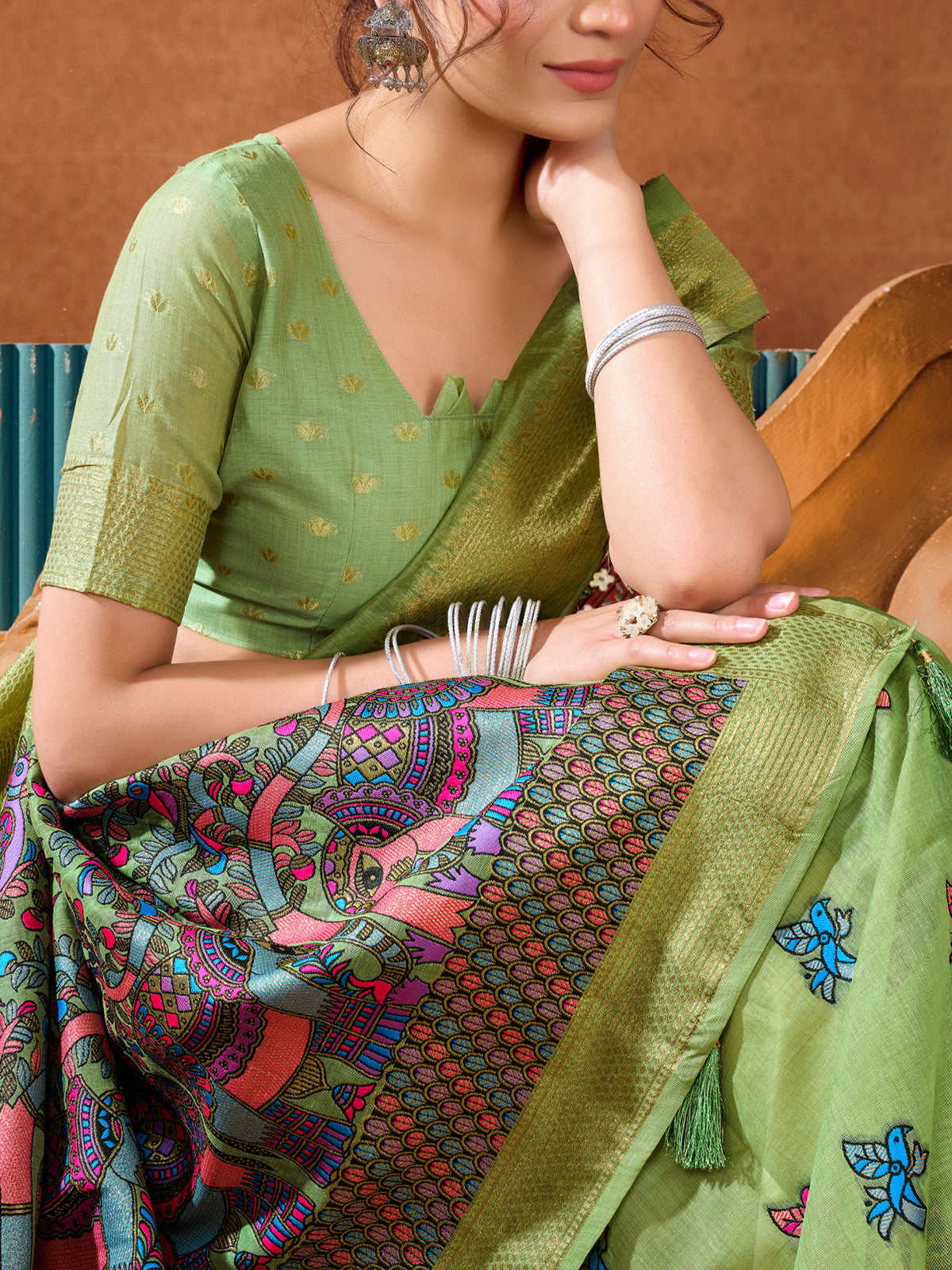 Pista green cotton linen saree with elegant zari border