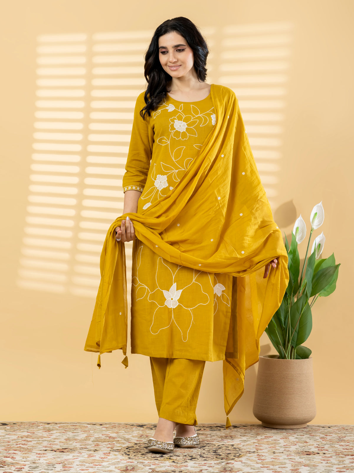 Mustard yellow linen kurti set with thread and bead work