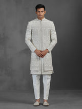Cream silk embroidered sherwani for groom