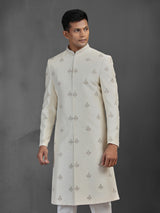 Cream silk wedding sherwani with butti work