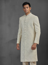 Cream silk wedding sherwani with embroidery