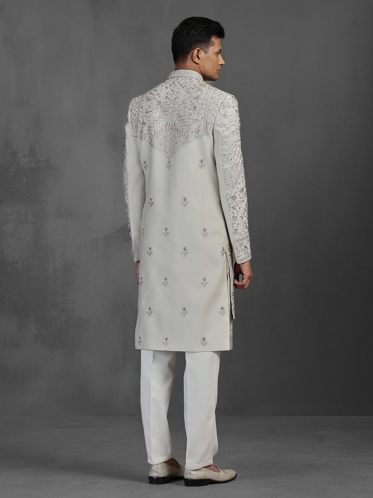 Cream silk groom sherwani with waist belt