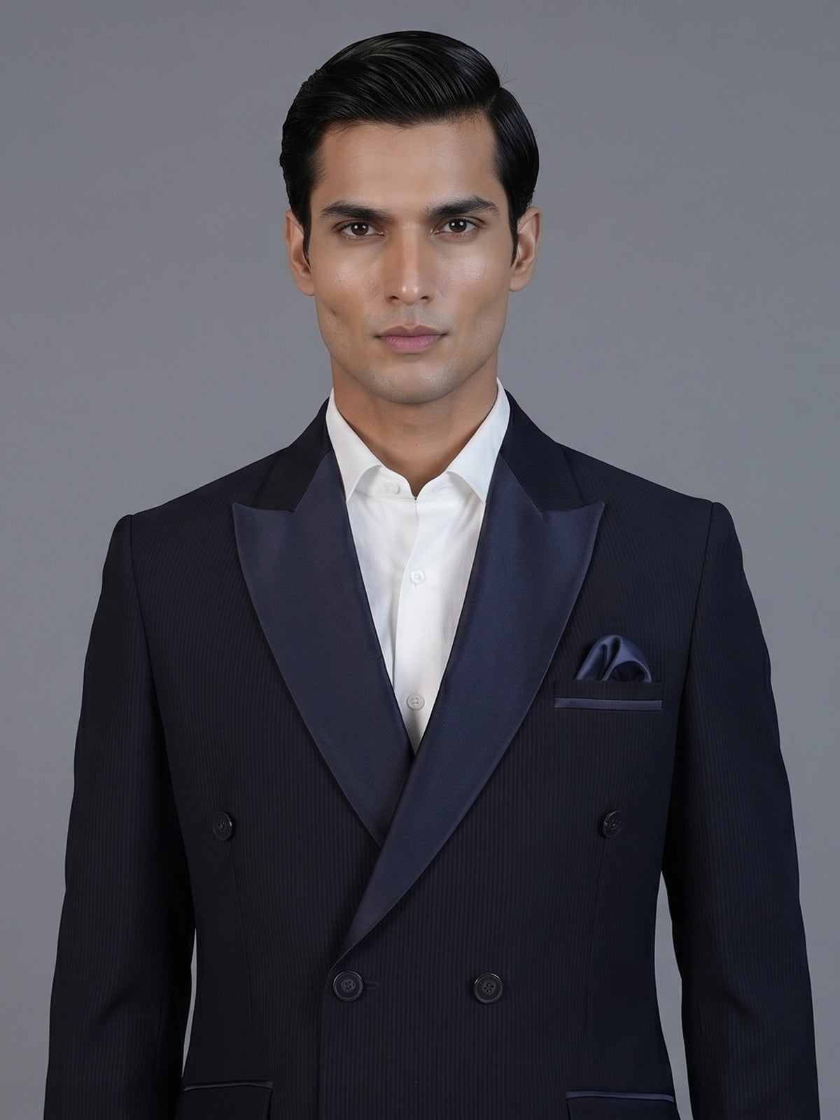 Navy blue designer double breasted suit with satin peak lapel finish