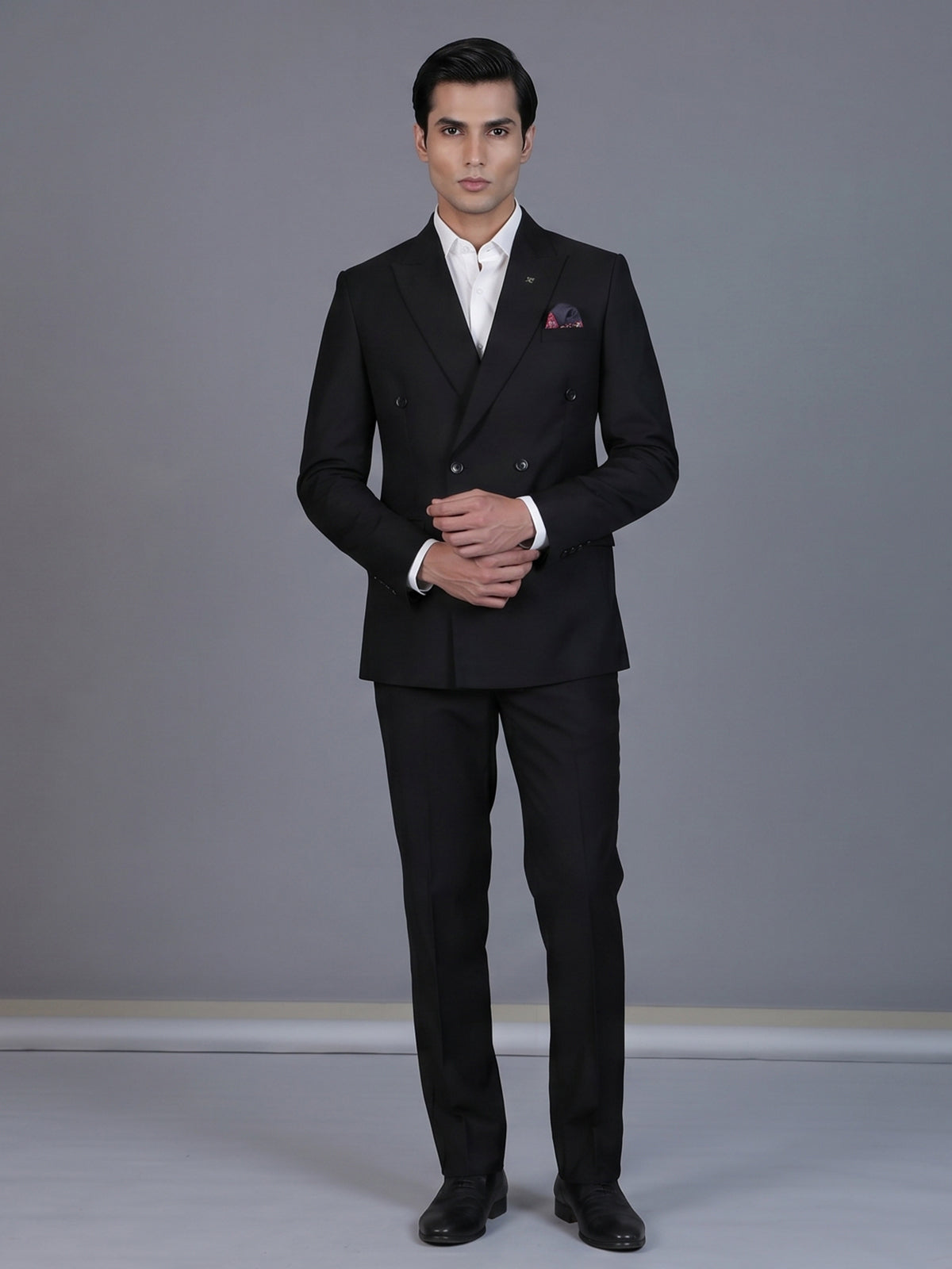 Classic black formal double breasted suit with bold peak lapel