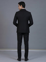 Classic black formal double breasted suit with bold peak lapel