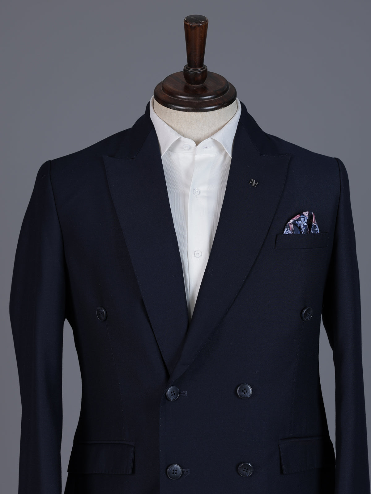 Elegant navy blue formal double breasted suit with peak lapel