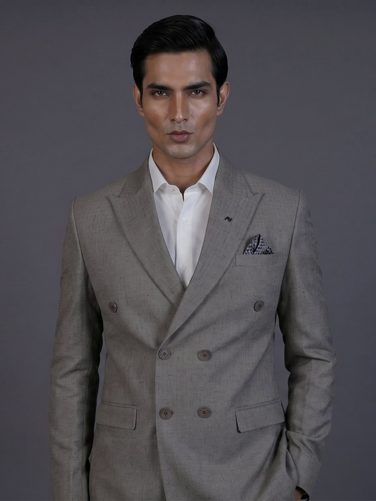 Taupe designer double breasted suit with textured birdseye peak lapel