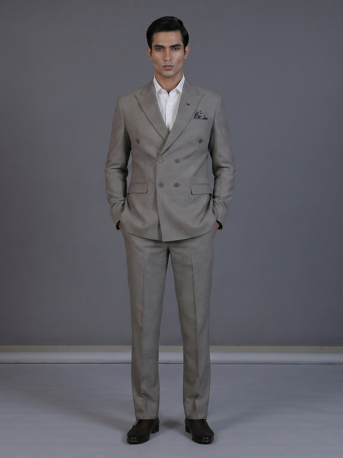 Taupe designer double breasted suit with textured birdseye peak lapel