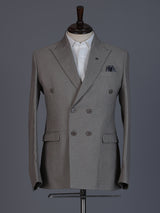 Taupe designer double breasted suit with textured birdseye peak lapel