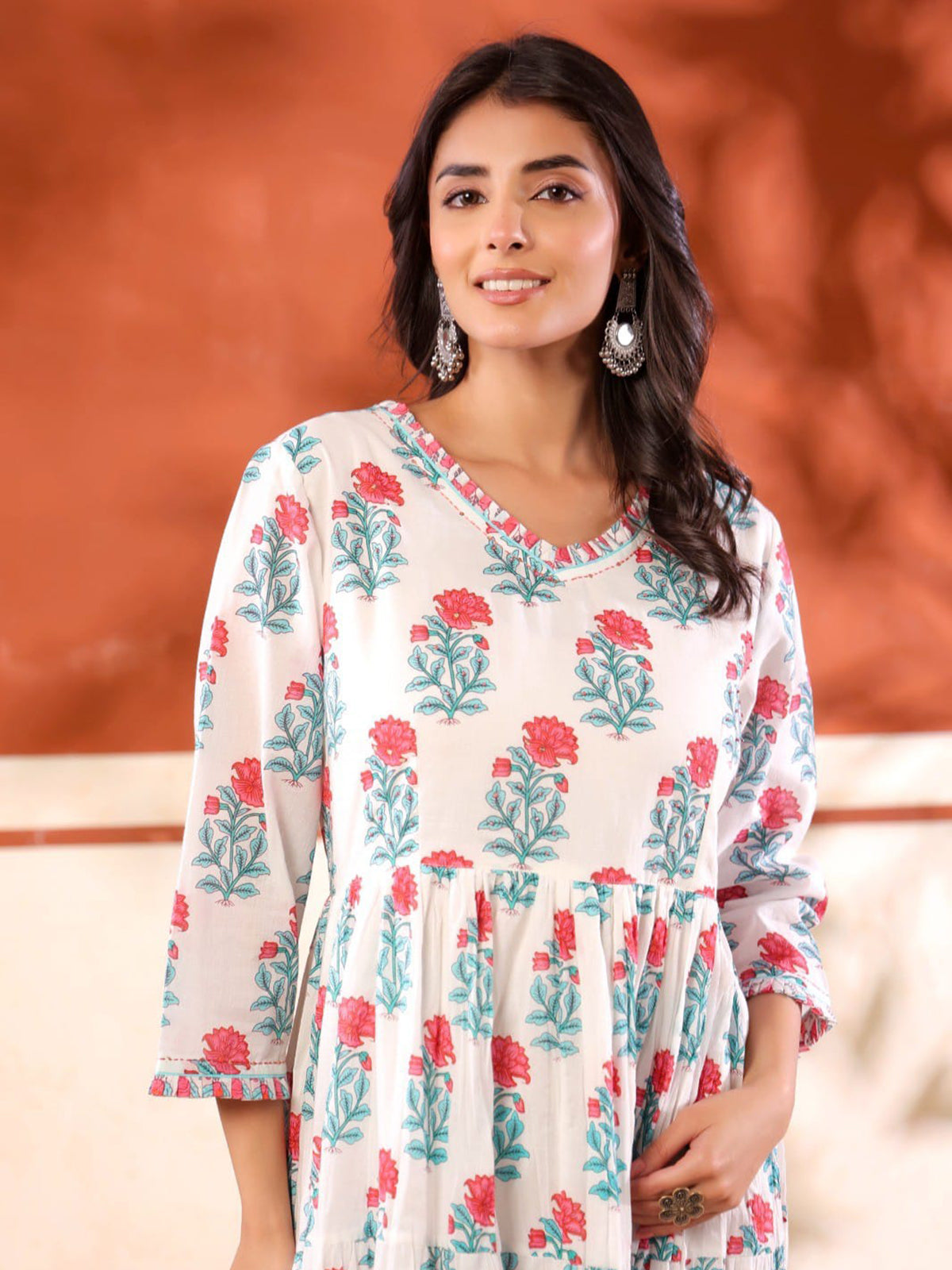 White cotton silk long kurti with pink and blue prints
