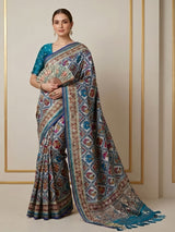 Blue semi patola silk saree with rich embellishments