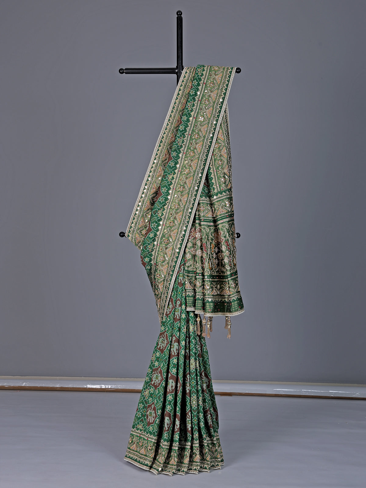Green art patola silk saree with elephant motif design