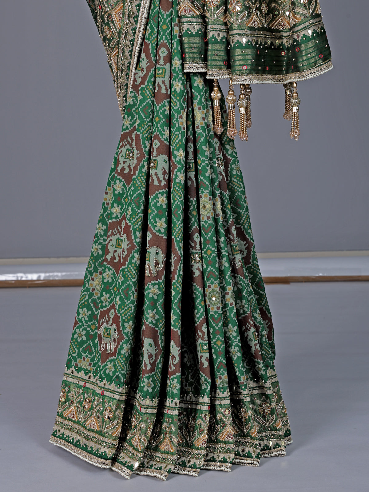 Green art patola silk saree with elephant motif design