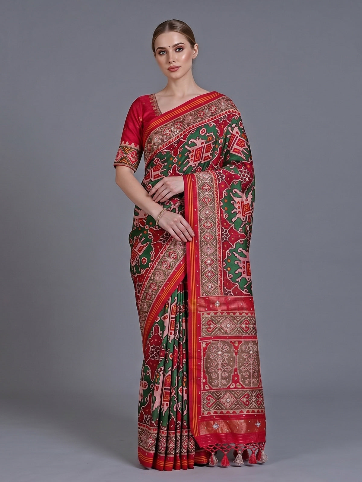 Green art patola silk saree with elephant motif detailing