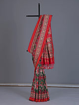 Green art patola silk saree with elephant motif detailing