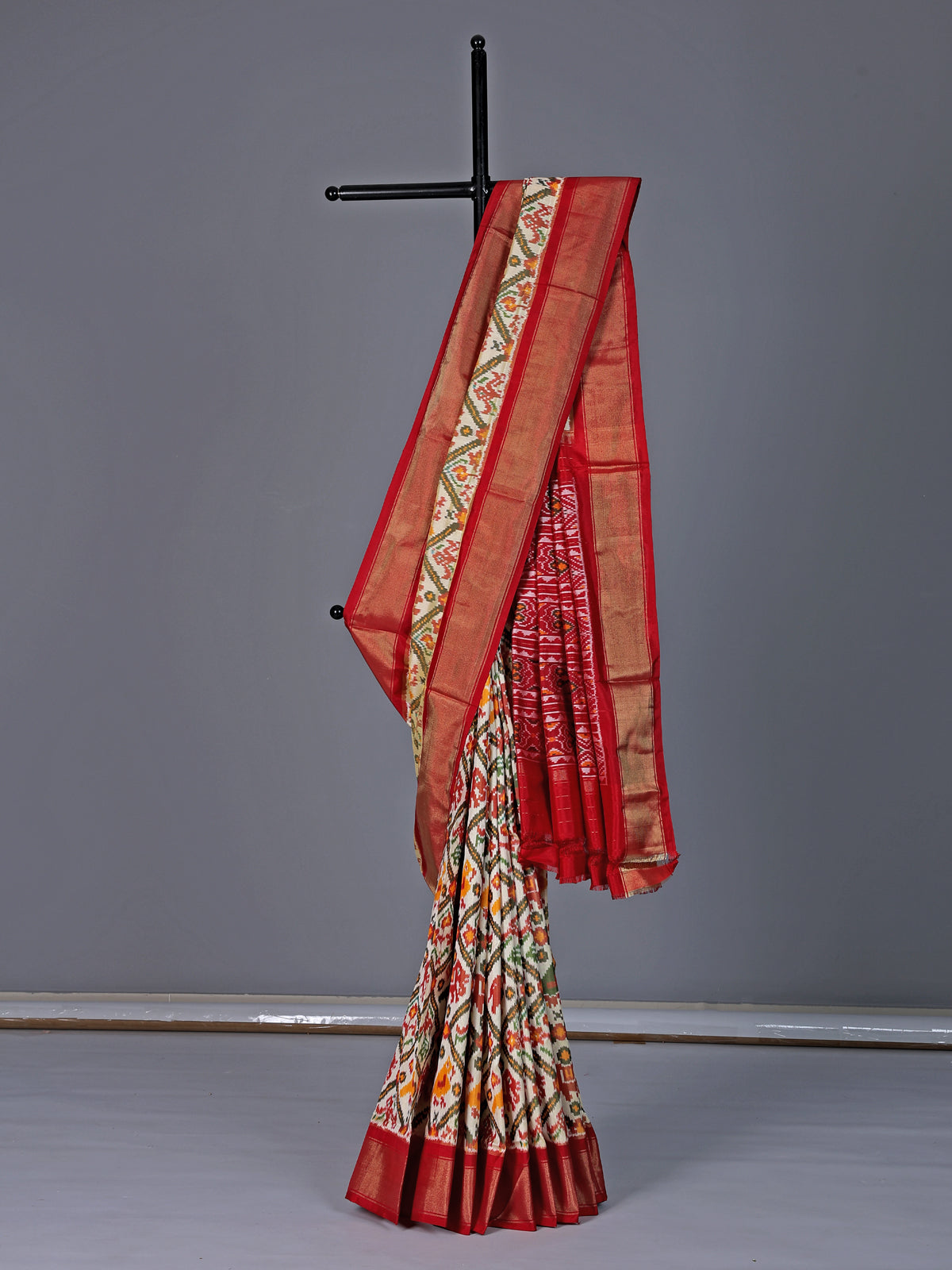 Off white pure hyderabadi patola silk saree with contrast border