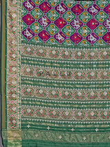 Purple and green art patola silk saree with motif design