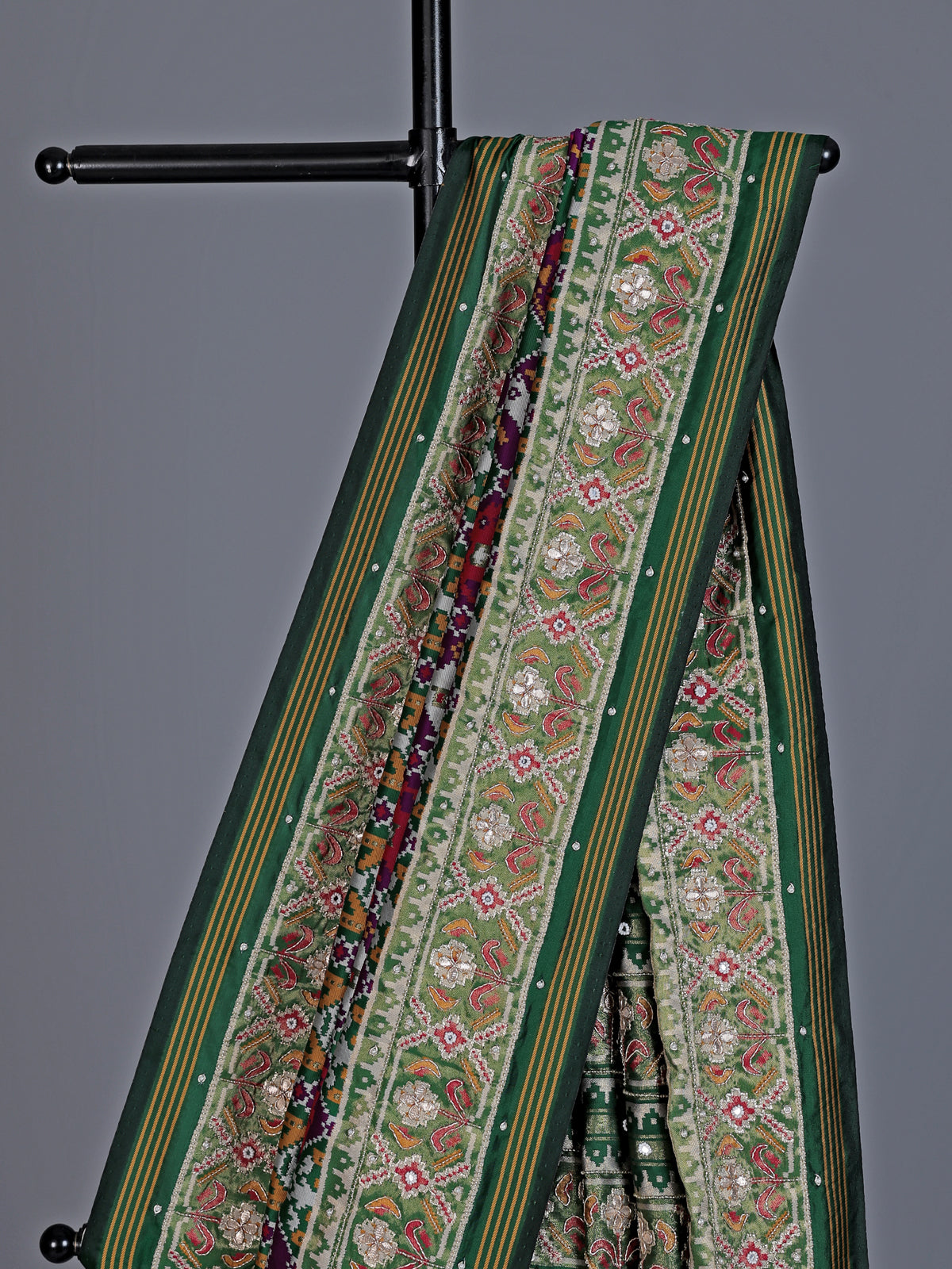 Purple and green art patola silk saree with motif design