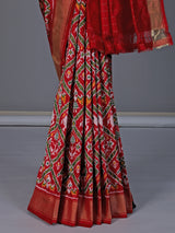 Red patola silk saree with contrast zari border