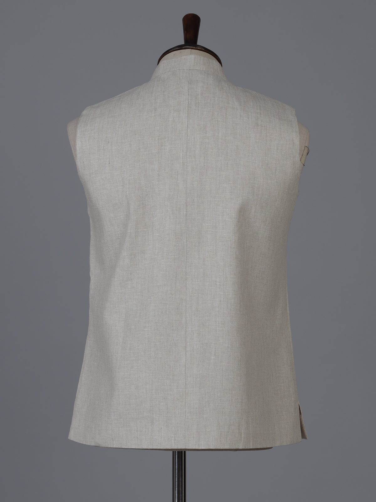 Beige linen waistcoat with brooch detailing