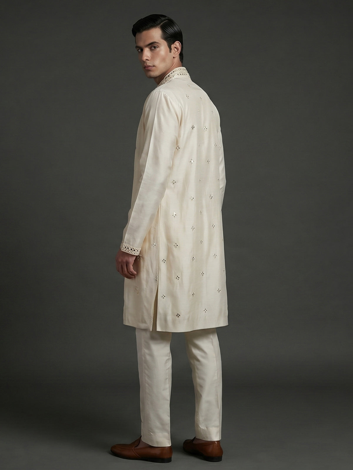 Cream silk kurta suiit with aabla and embroidery work