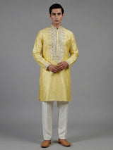 Yellow silk kurta suiit with aabla and embroidery design