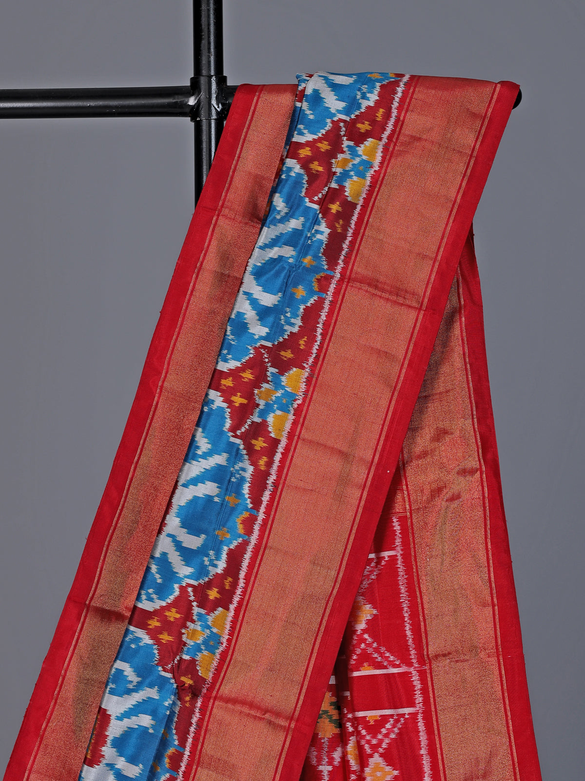 Blue patola silk saree with elephant motif border