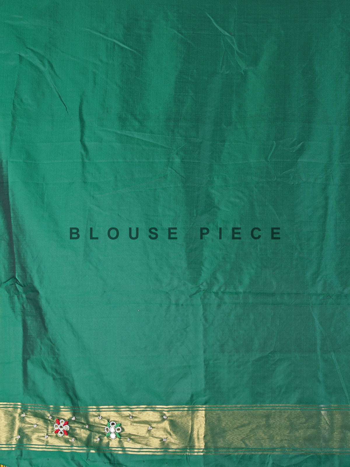 Green and white patola silk saree with rich embellishments