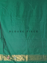 Green and white patola silk saree with rich embellishments