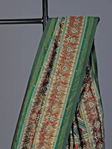 Green and white patola silk saree with rich embellishments