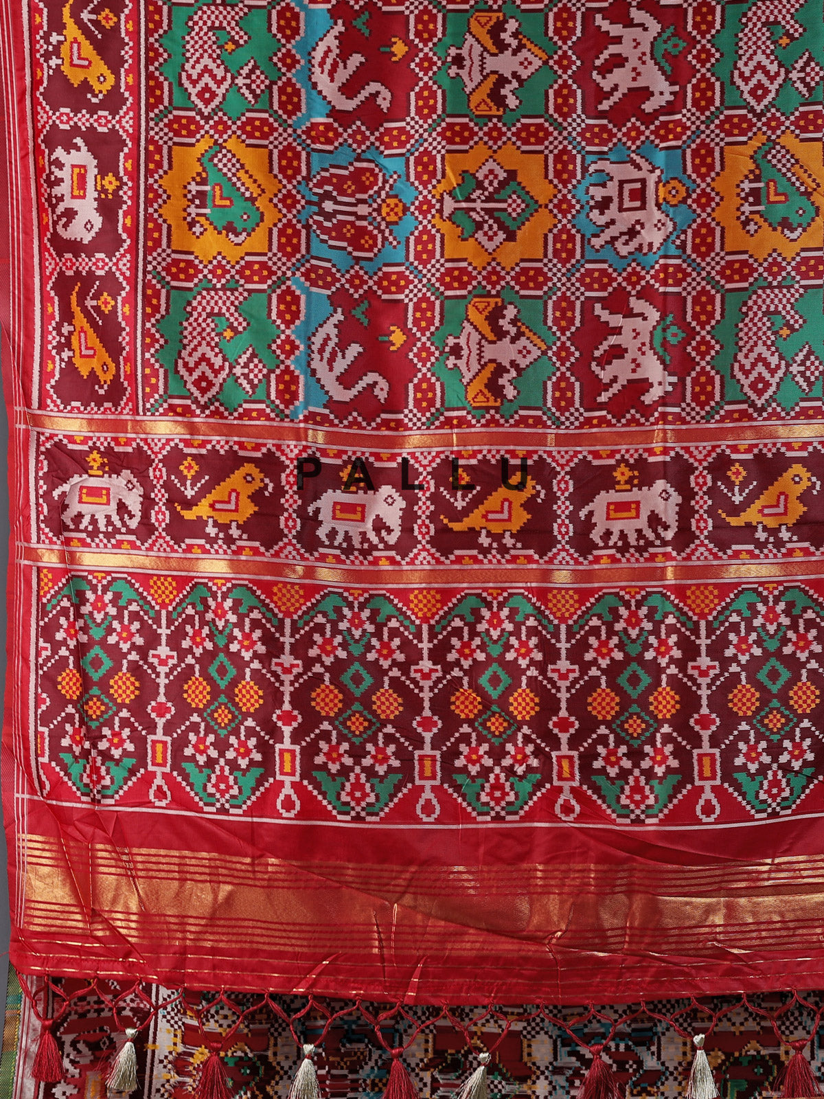 Maroon patola silk saree with zari pallu design