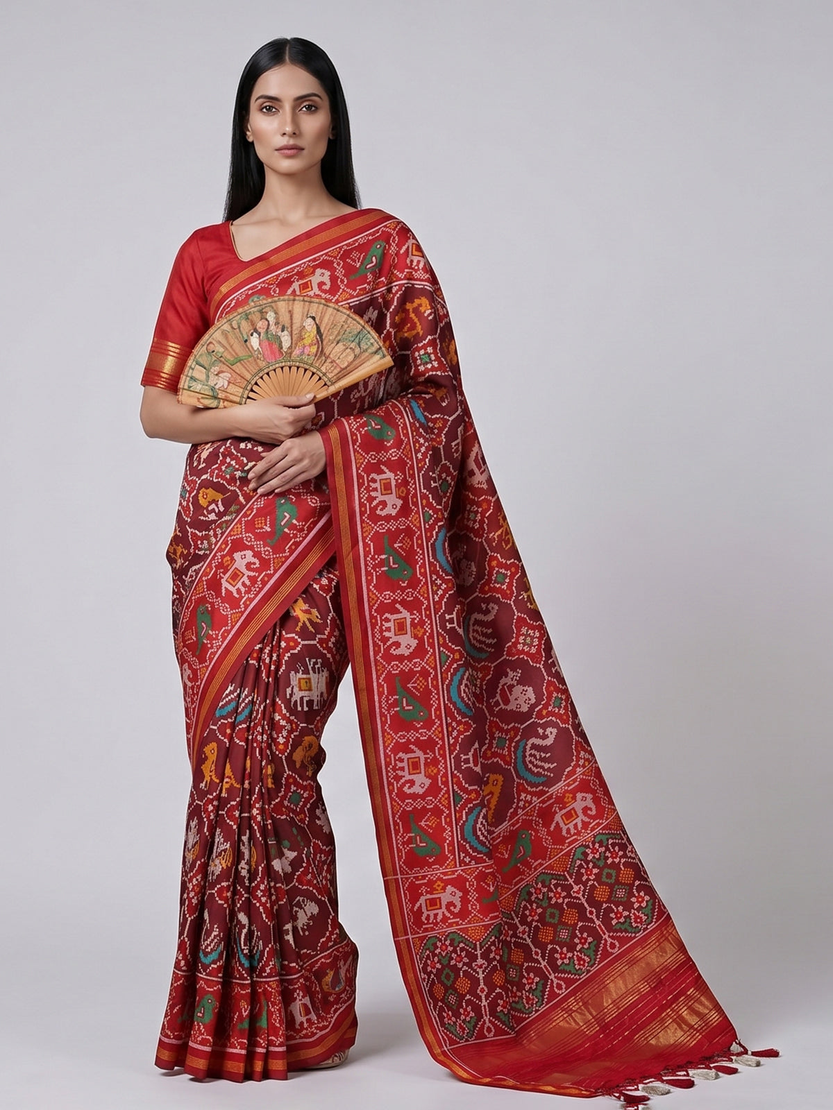 Wine patola silk saree with elegant zari pallu
