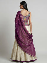 Violet and cream silk lehenga choli with zardosi work