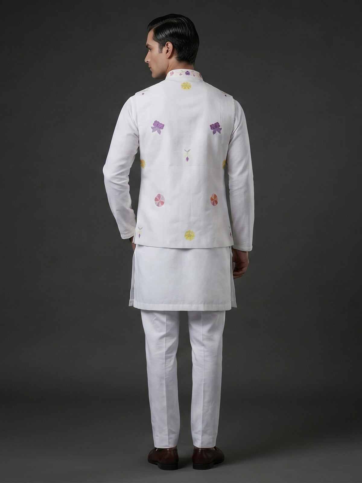White silk waistcoat set with colorful floral thread