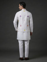 White silk waistcoat set with colorful floral thread