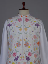 White silk waistcoat set with colorful floral thread