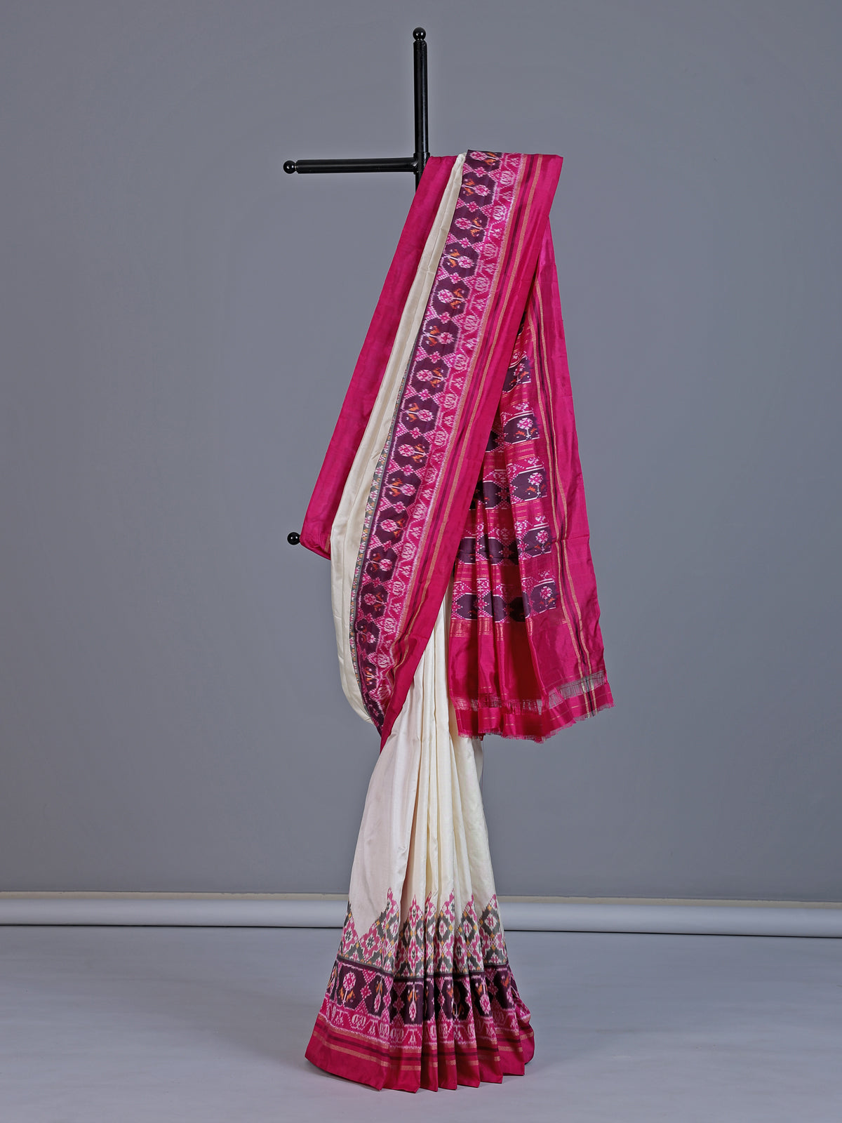 Cream pure hyderabadi patola silk saree with colorful motif border