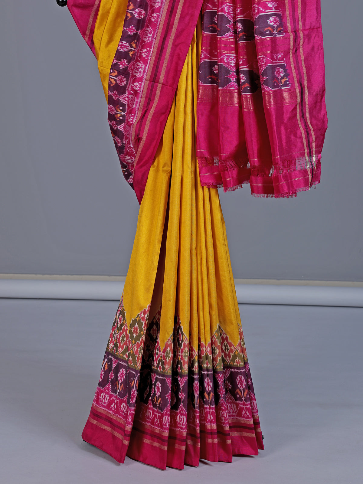 Mustard yellow pure hyderabadi patola silk saree with vibrant motif border