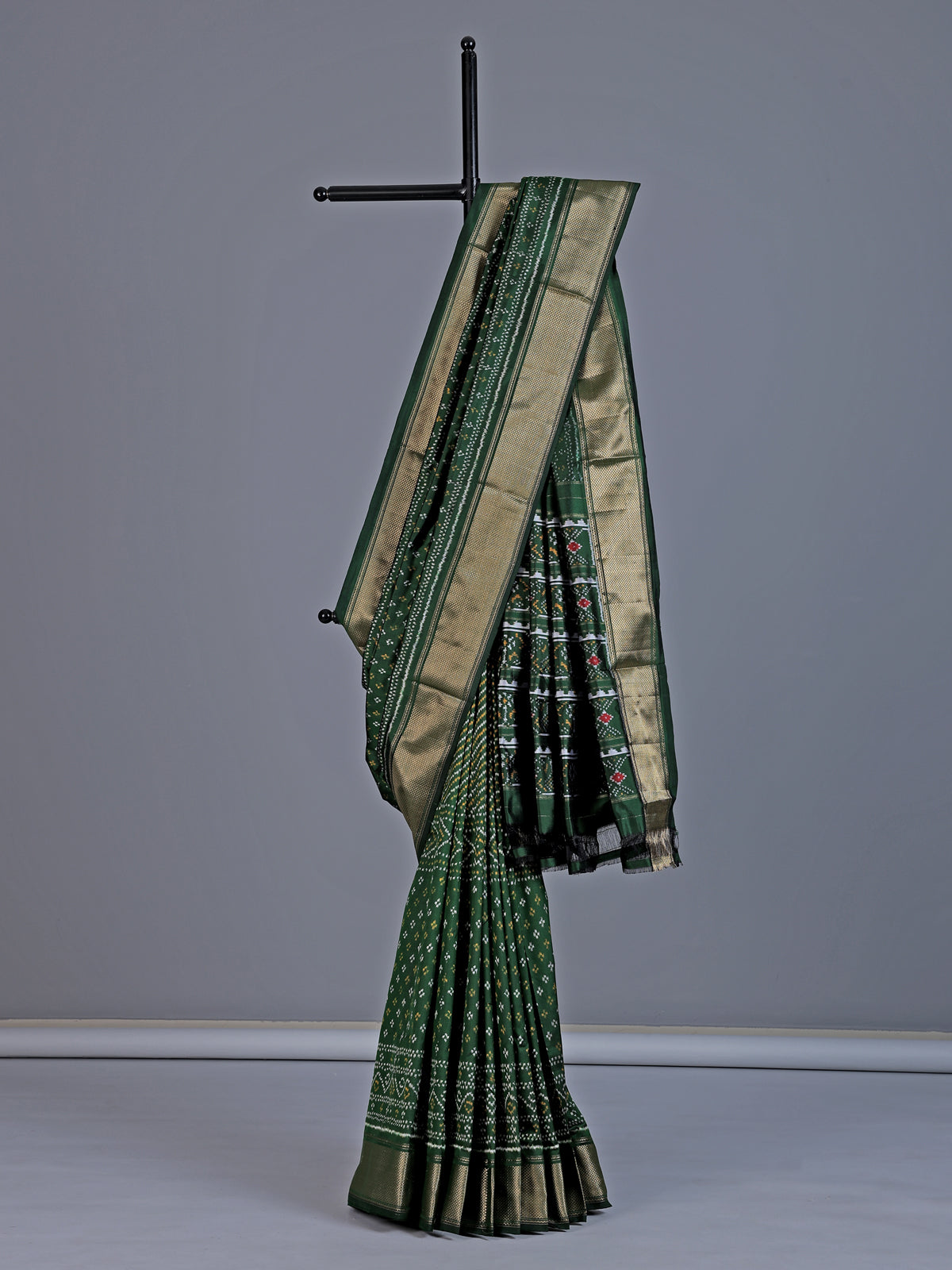 Dark green pure hyderabadi patola silk saree with zari border