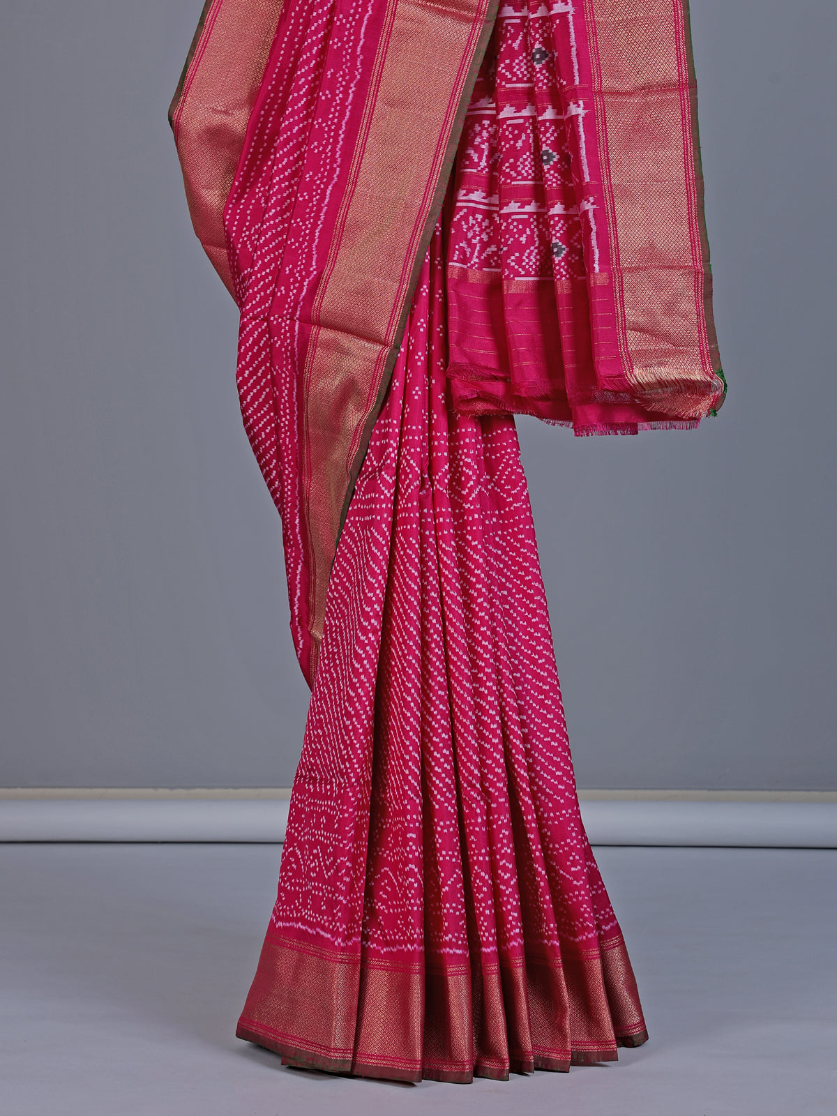 Rani pink pure hyderabadi patola silk saree with zari border