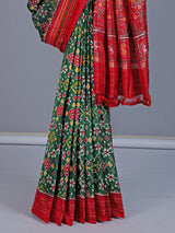 Green pure hyderabadi patola silk saree with elephant bird motif pallu